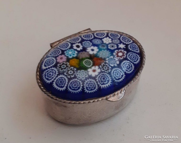 Silver-colored chiseled medicinal jewelry box with millefiori glass decoration on top