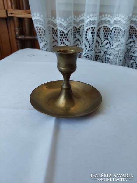 Small, handmade copper candle holder, very shapely and practical