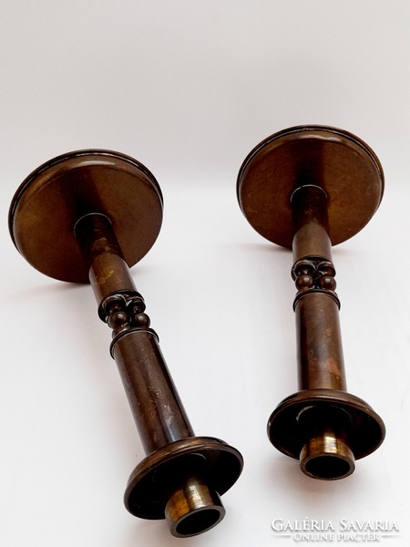 Pair of copper candle holders, 18 cm