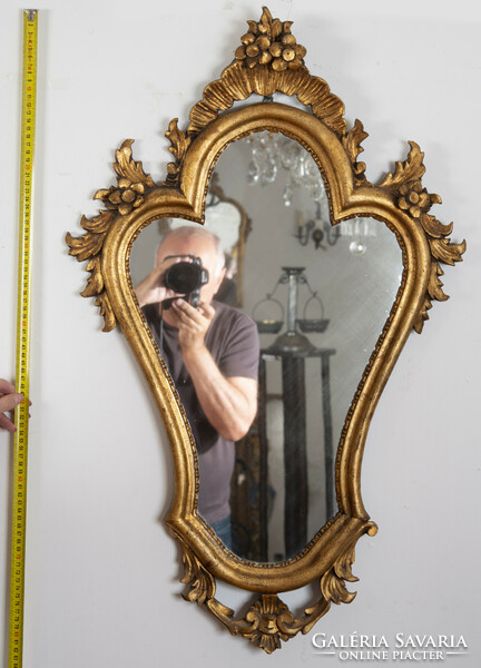 Gilded wood framed mirror with floral decor