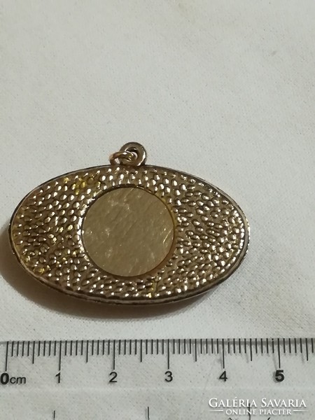 Old amber pendant.