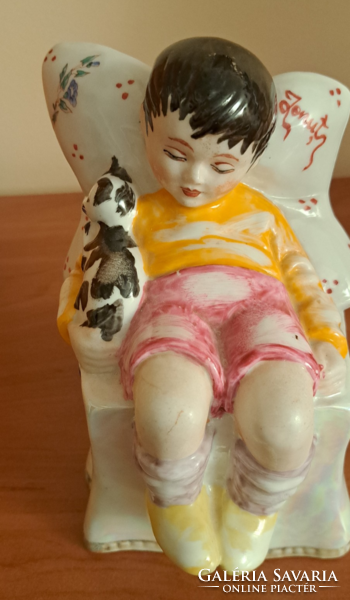 Porcelain sleeping child with a cat