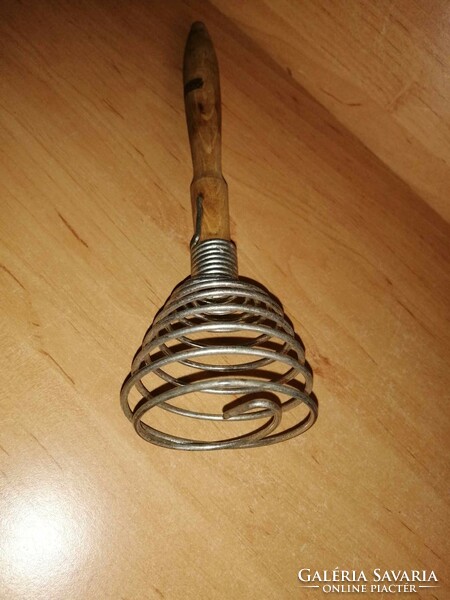 Old spring hand whisk