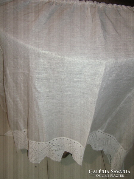 Beautiful vintage crocheted white curtain with lace bottom