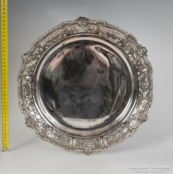 Silver devil's head round tray with an openwork pattern
