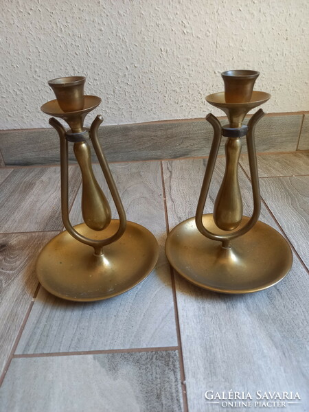 Interesting pair of antique tilting copper candle holders (21.5x15x2.1 cm)