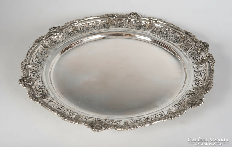 Silver devil's head round tray with an openwork pattern