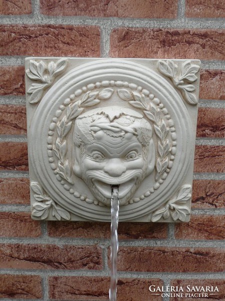 Ancient Greek gargoyle, wall fountain