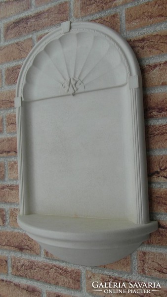 Stone niche for flowers, statues, home altar