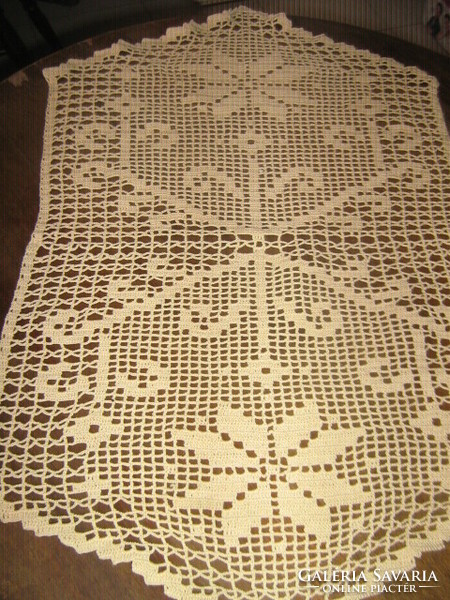 Beautiful beige hand-crocheted floral antique lace tablecloth