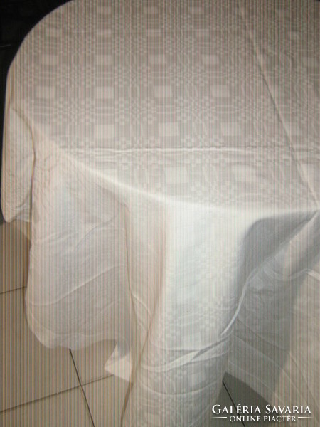 Beautiful and elegant white huge damask tablecloth