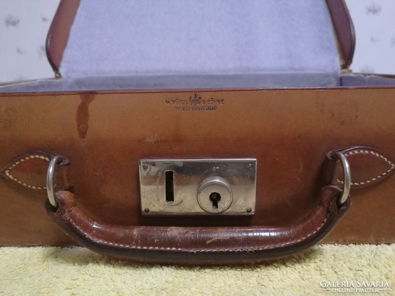 Antique small leather suitcase