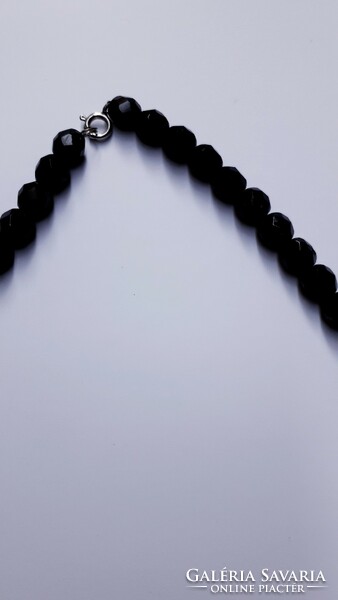 Black, polished retro necklace, old, in mint condition.