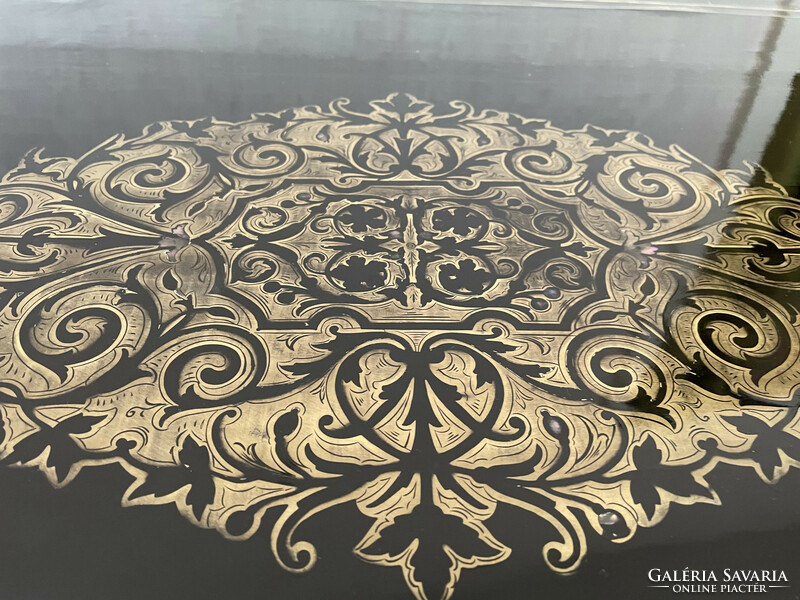 Boulle-style copper and mother-of-pearl inlaid polished oval table