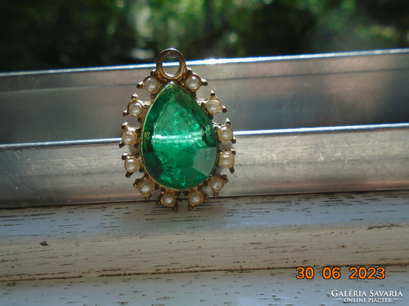 Older copper pendant inlaid with faceted green stone and pearls