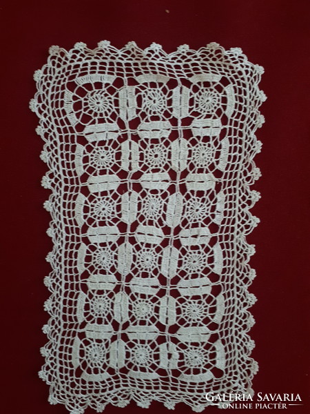 Breathtakingly delicate crocheted lace tablecloth