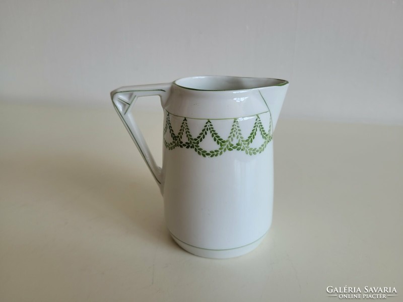 Old porcelain small jug Art Nouveau milk spout with plant garland