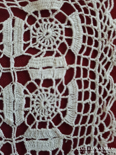 Breathtakingly delicate crocheted lace tablecloth