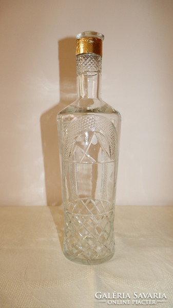Brushed glass bottle with grape pattern