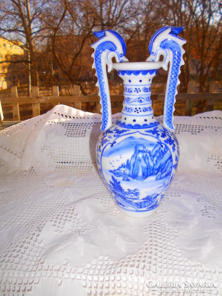 Porcelain vase in immaculate condition with hand-painted landscape pattern with dragon snake bite on the edge