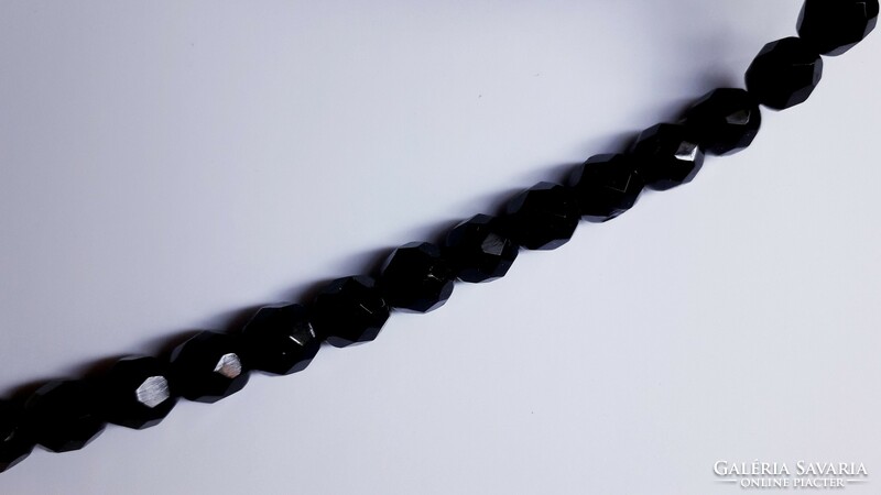 Black, polished retro necklace, old, in mint condition.