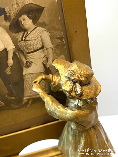 Art Nouveau metal photo photo frame decorated with a statue of a little girl