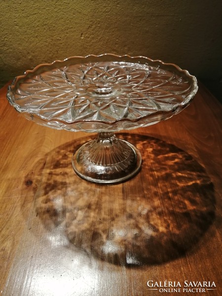 Glass bowl with cake and fruit