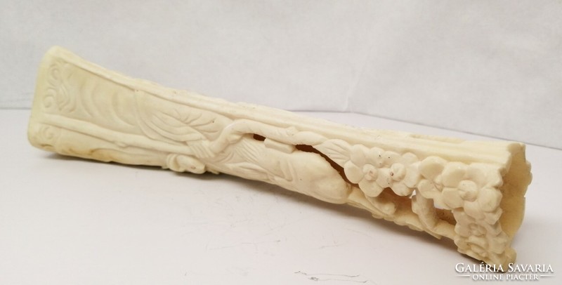 Bone carving with a Chinese sage and a young lady. A unique antique handcrafted artefact is a rarity