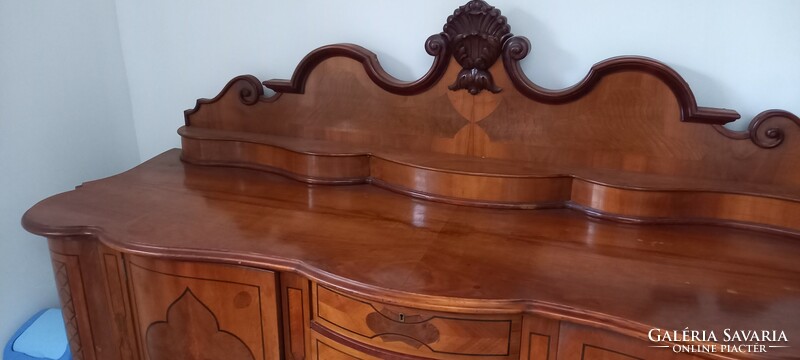 Antique sideboard with inlaid lion legs