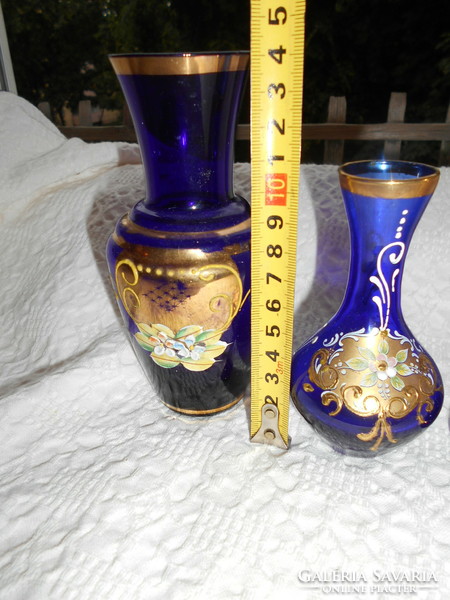 3 Bohemian plastic porcelain blue glass vases with flowers together.