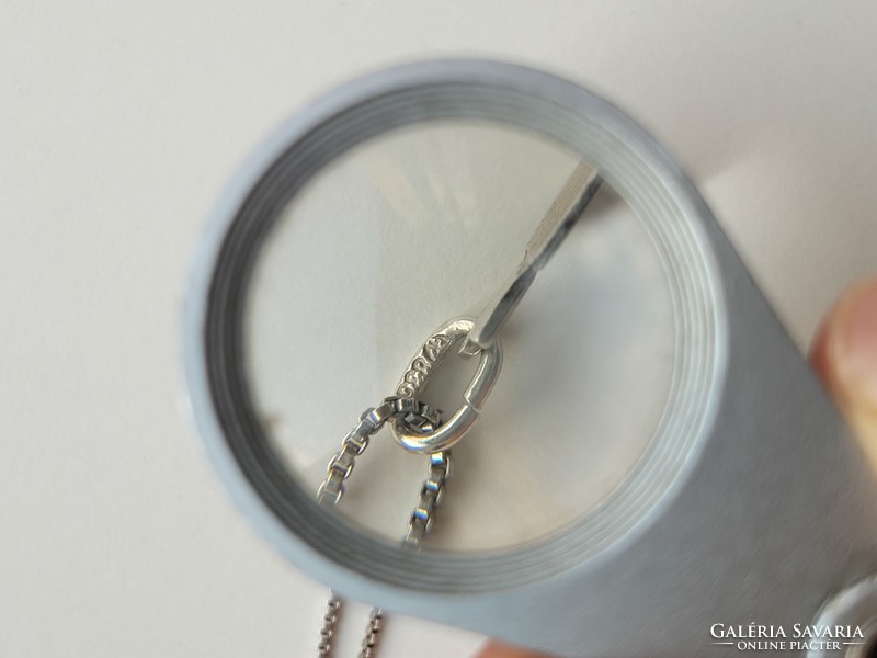 Silver necklace with silver ping pong racket and heart pendant!