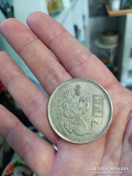 Silver coin with Chinese zodiacs