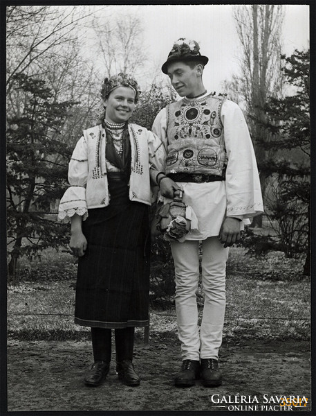 Larger size, photo art work by István Szendrő. Folk costume of a young couple from Gyimesközéplok (Transylvania).