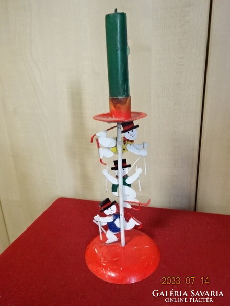 Metal candle holder with skiing snowmen, height 21.5 cm. Jokai.