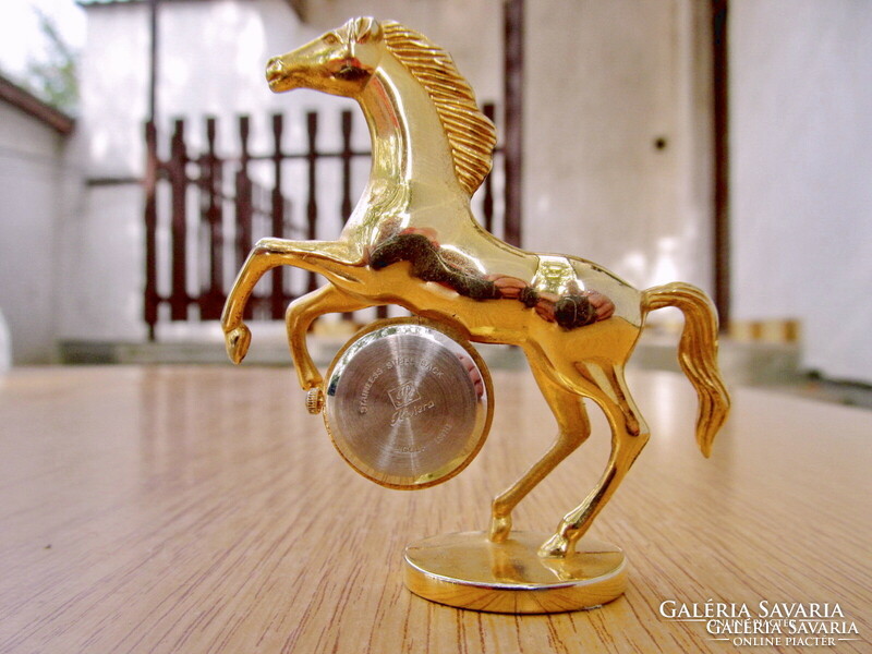 Gilded paripa, horse table clock (Italian, riviera clock mechanism, 7.5cm.)