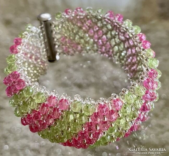 Extravagant wide women's capricho bracelet strung with polished green and pink beads