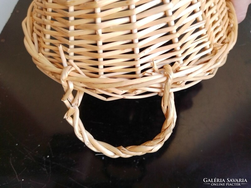 Old hand-woven cane fruit and bread storage basket with ears