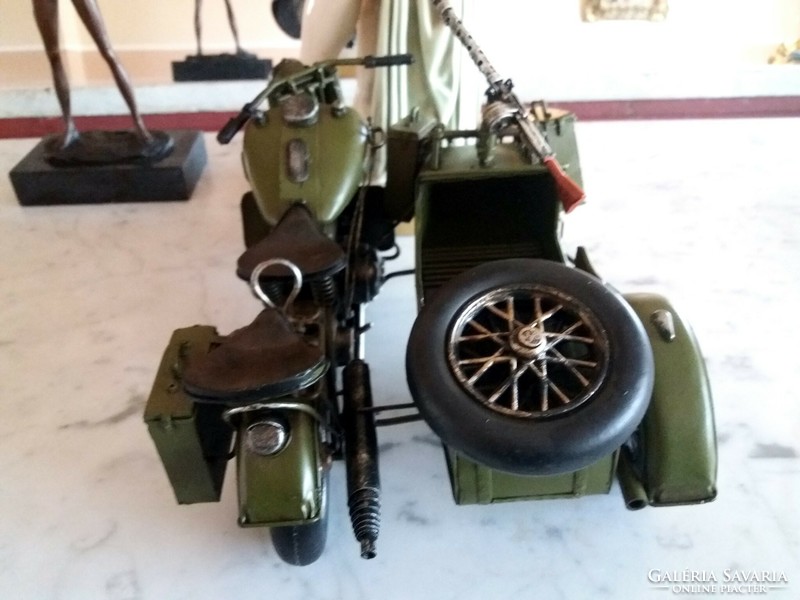 Military motorcycle with sidecar, equipped with a machine gun