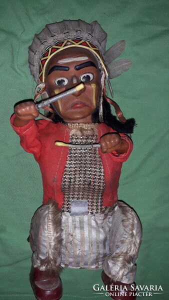 Vintage metal plate sheet goods and plastic figure sitting drummer indian joe toy 30 cm according to the pictures