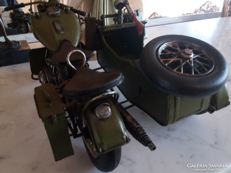 Military motorcycle with sidecar, equipped with a machine gun