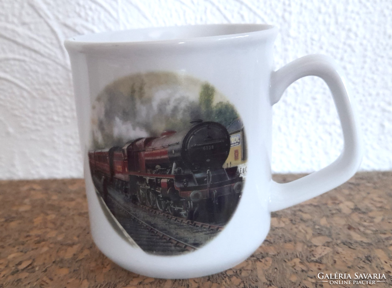 Old porcelain mug with royal scotch steam engine