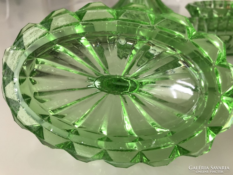 Antique toilet set made of bright green glass