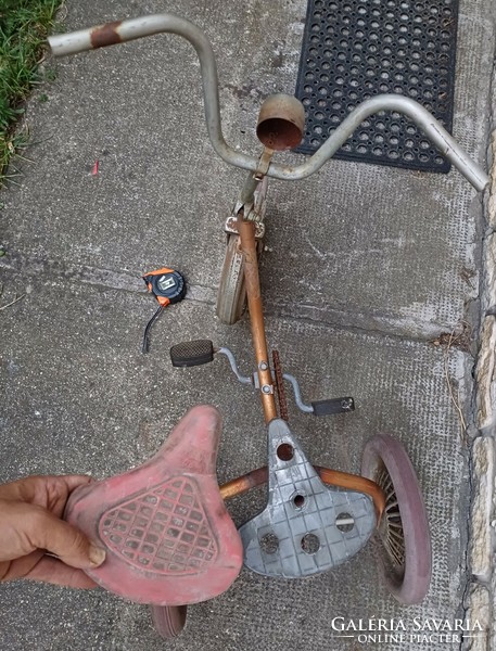 Antique three-wheel bicycle, pair of wheels.