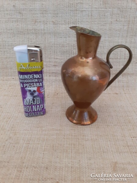 Retro copper vase in the shape of a small jug