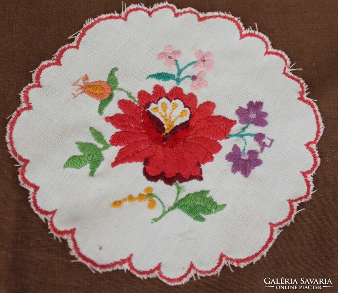 Small round embroidered tablecloth