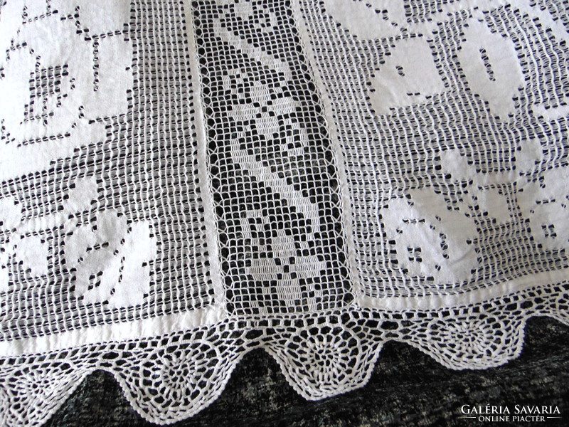 Antique hand-woven Transylvanian tablecloth with a rose pattern