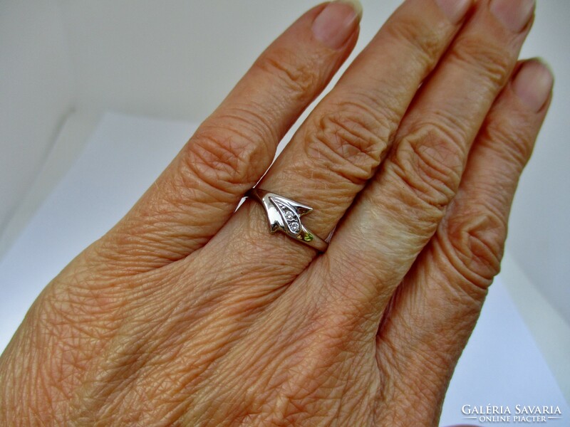 Elegant white gold ring with diamond stones