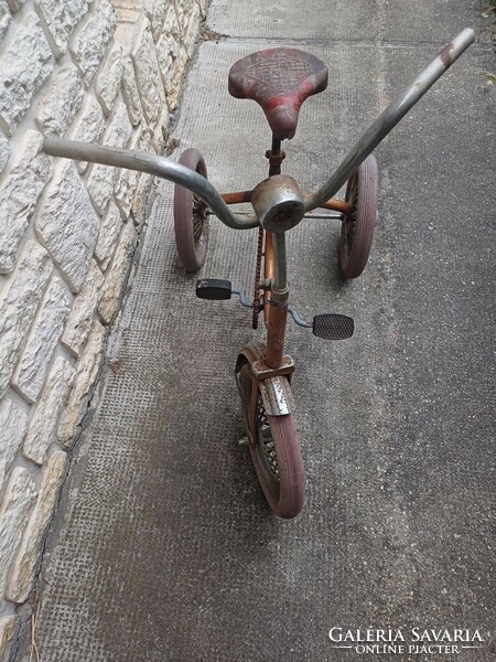 Antique three-wheel bicycle, pair of wheels.