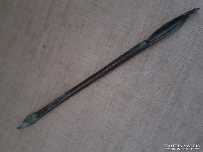 Old wrought iron hand drill with a carpenter's master's mark