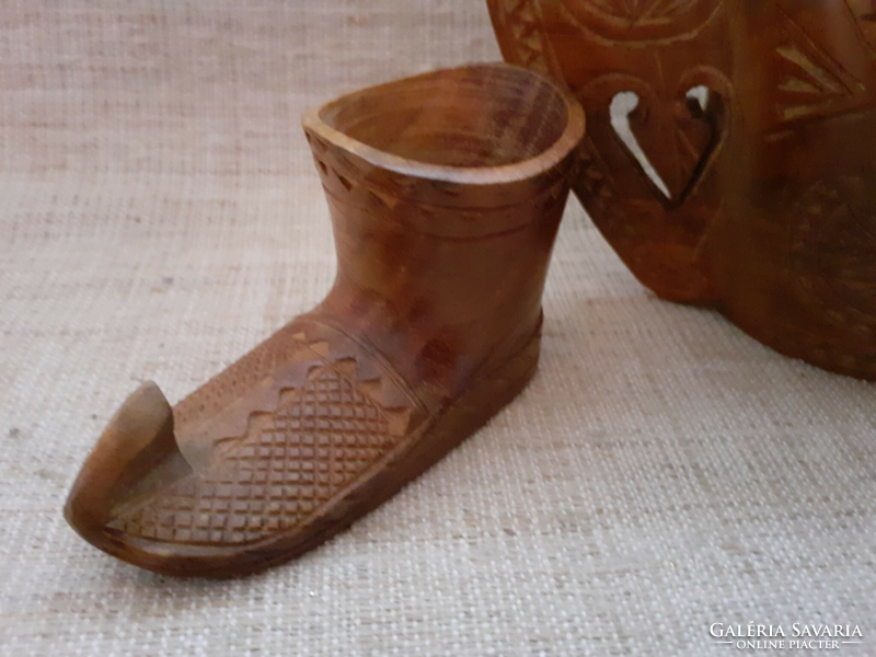 A gift for a discerning folk carved drinker with a carved shoe